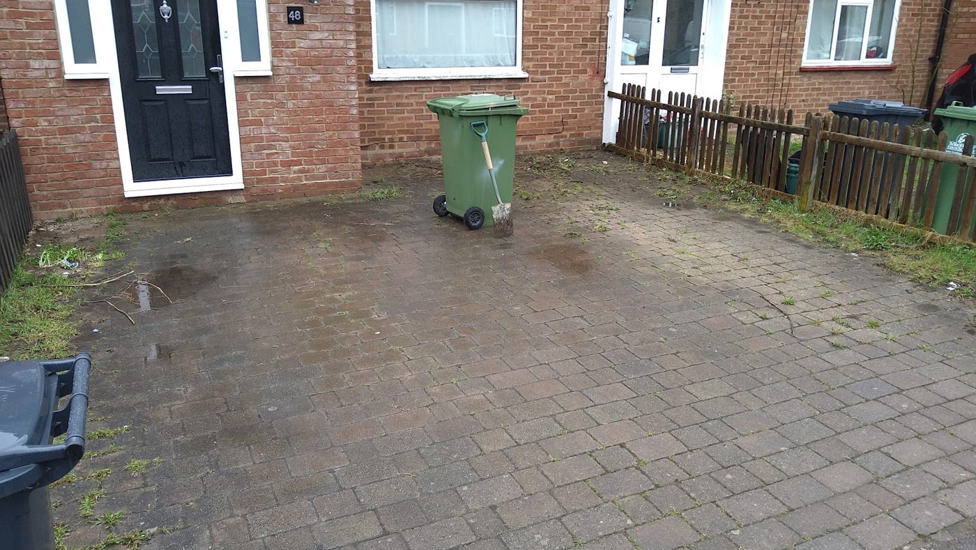Block paving driveway before cleaning
